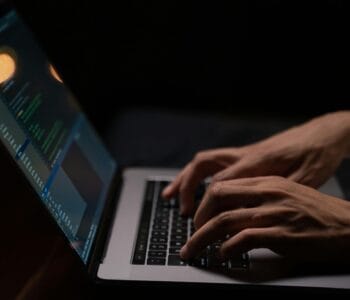 person-using-silver-and-black-laptop-computer