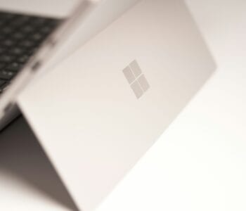 white-laptop-computer-on-white-table