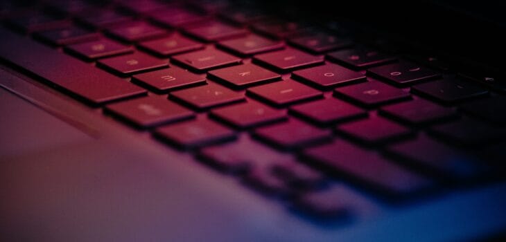 a-close-up-of-a-keyboard-with-a-blurry-background