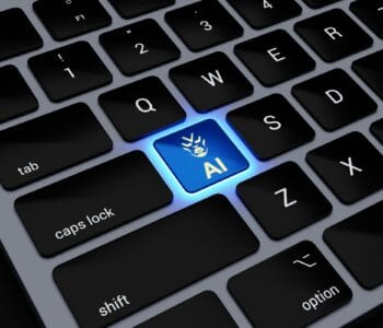 a computer keyboard with a blue light on it