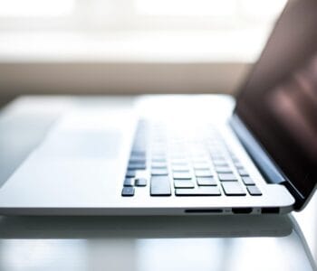 shallow-focus-photography-of-macbook