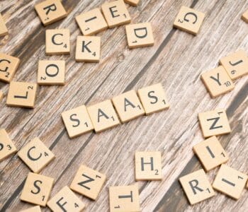 scrabble-letters-spelling-saas-on-a-wooden-tabl