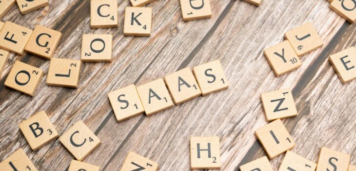 scrabble-letters-spelling-saas-on-a-wooden-tabl
